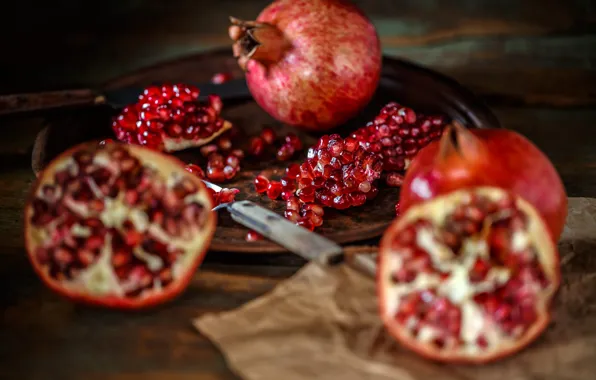 Table, knife, grenades, bokeh, pomegranate grains