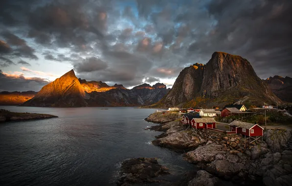 The sky, light, mountains, clouds, stones, rocks, shore, tops