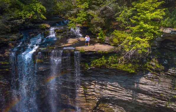 Greens, forest, the sun, trees, rock, stones, people, waterfall