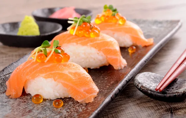 Table, sticks, figure, sushi, wasabi, ginger, red caviar, salmon
