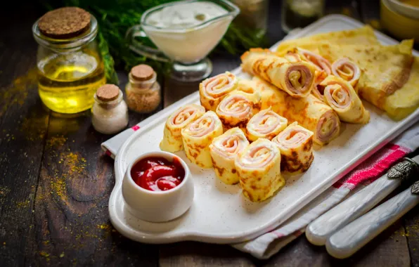 Pancakes, sauce, rolls, filling