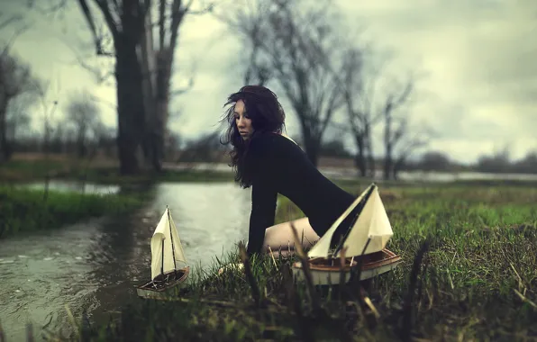 Girl, river, boats