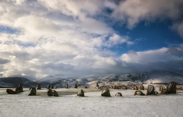 Winter, field, clouds, snow, mountains, blue, stones, megaliths