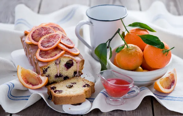 Picture still life, cupcake, tangerines