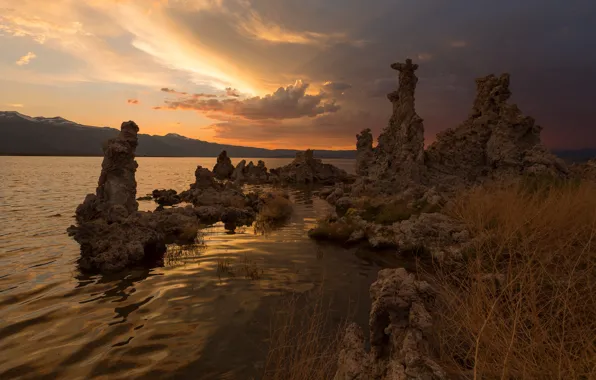 The sky, clouds, light, sunset, mountains, stones, hills, shore