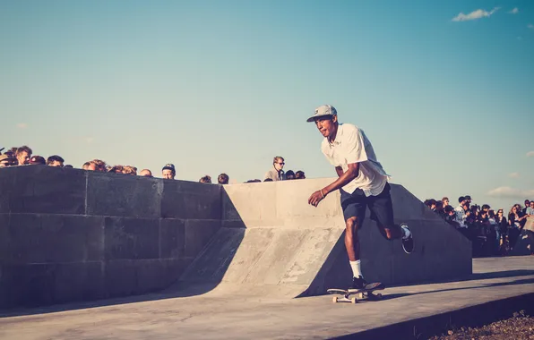 Picture the sky, clouds, people, skateboard, skateboarder, extreme sports