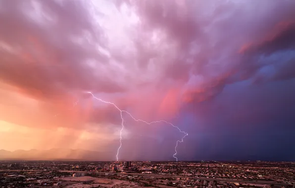 The storm, clouds, the city, lightning