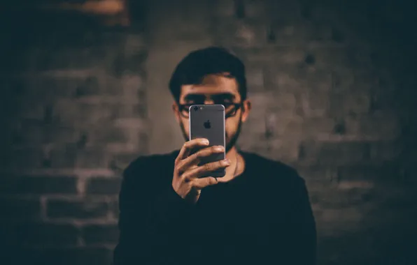 Face, room, wall, iPhone, hands, glasses, male