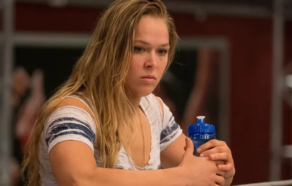 Picture the champion of UFC, Ronda Rousey, Rowdy, MMA fighter
