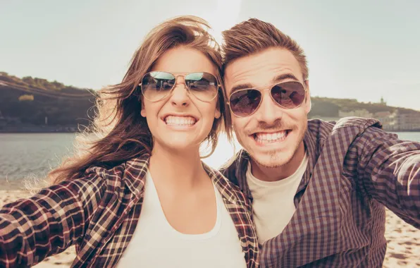 Girl, man, smiles, reflection, sunglasses, photo camera