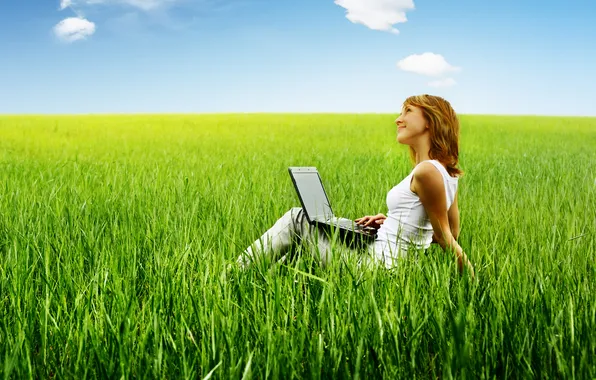 The sky, grass, girl, clouds, smile, jeans, laptop, brown hair