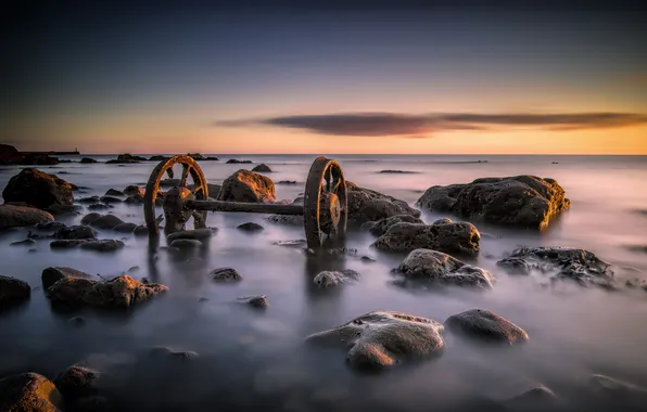 Sea, sunset, stones, wheel