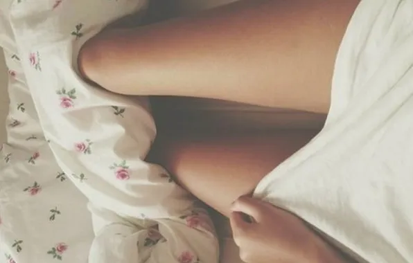 Girl, bed, slender legs, white t-shirt
