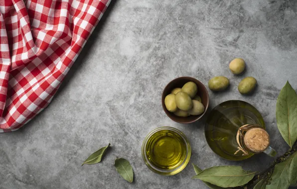 Towel, grey background, olives, olive oil