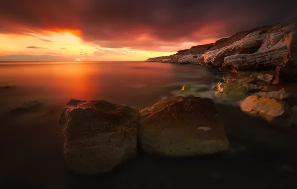 Sunset, lake, stones