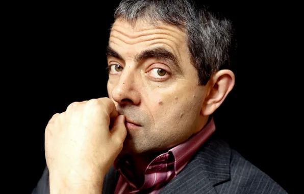 Picture face, hand, Rowan Atkinson