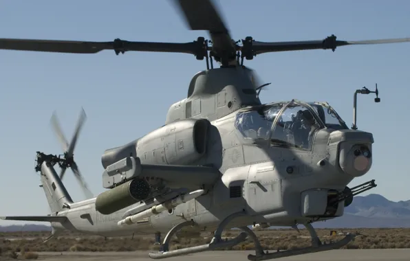 Missiles, pilots, machine gun, helicopter, AH-1
