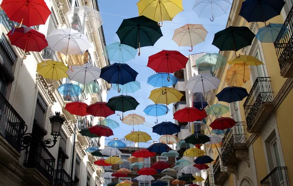 Picture the city, street, umbrellas