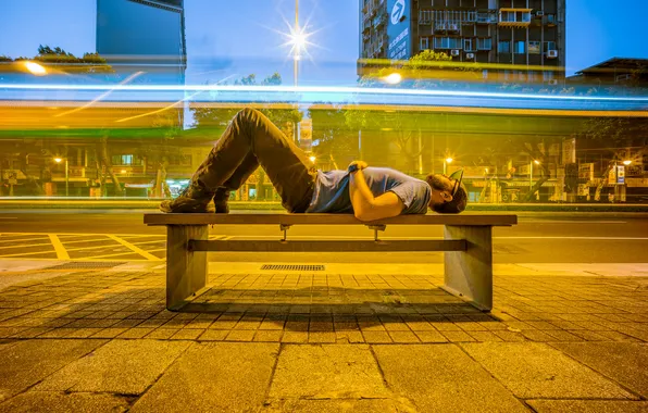 Picture bench, the city, street, building, lights, male, stores, lying