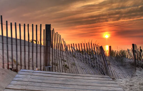 Sand, the sun, shore, The fence