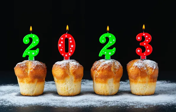 Candles, figures, New year, black background, cakes, date, cupcakes, powdered sugar