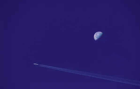 The sky, the moon, the plane