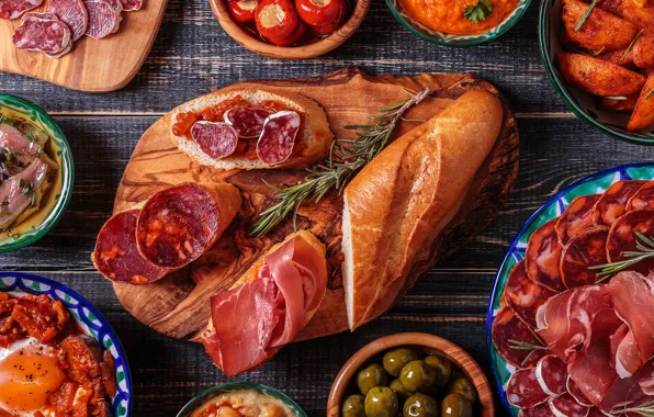 Bread, meat, olives, sausage, cuts