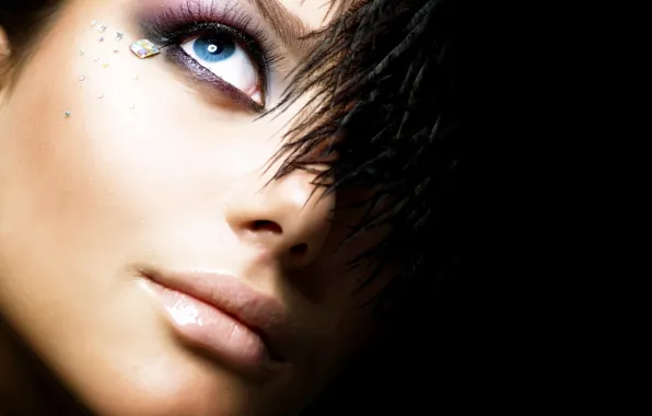 Picture girl, eyes, feathers, makeup, rhinestones, black background