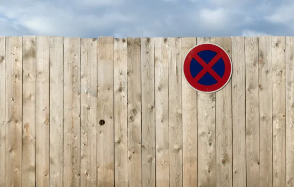 The sky, sign, the fence