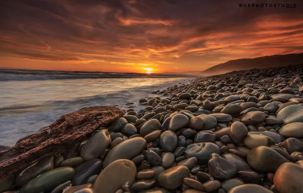 Sea, the sky, the sun, light, stones, shore, the evening