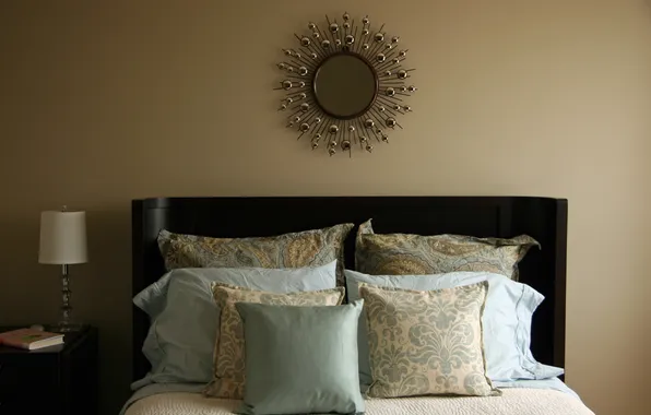 Picture lamp, pillow, mirror, bed