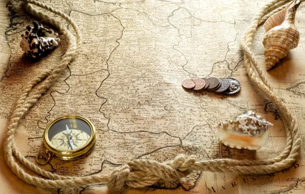 Paper, map, rope, shell, coins, compass