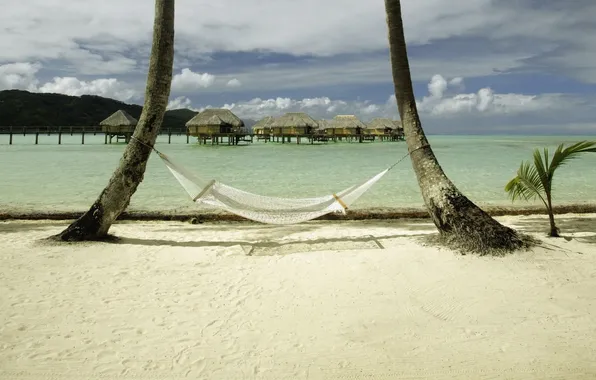 Sand, hammock, houses