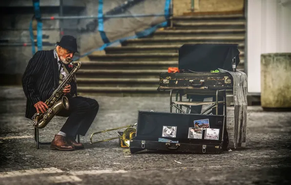 The city, street, Prague, musician, saxophone