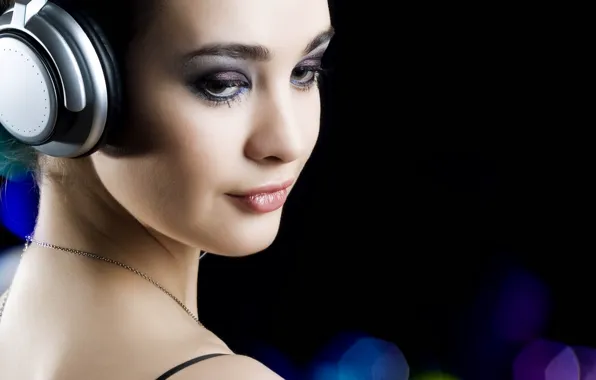 Picture girl, glare, headphones, black background