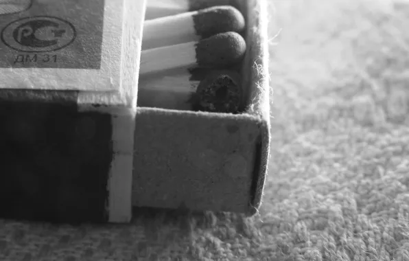Matches, black and white, carpet