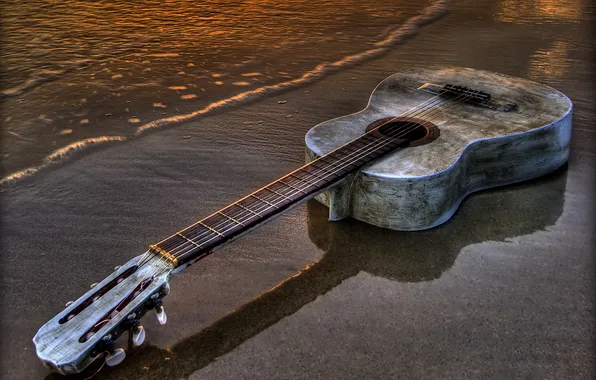 Picture sand, water, music, guitar