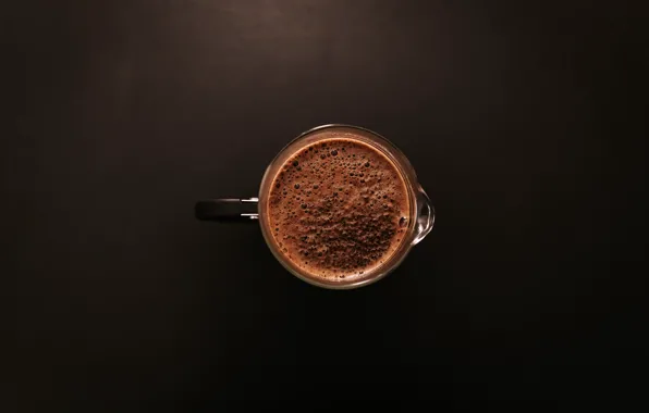 The view from the top, on the table, a Cup of coffee, coffee foam