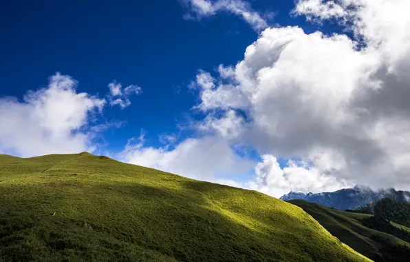 Picture the sky, grass, clouds, mountains, slope