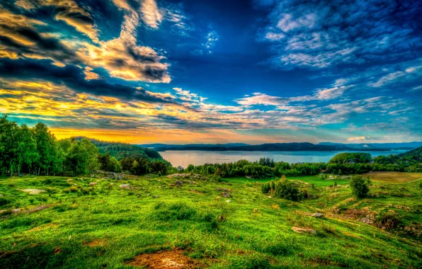 The sky, grass, clouds, trees, sunset, lake, stones