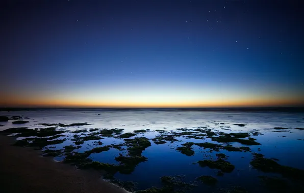 Stars, the ocean, dawn, Argentina
