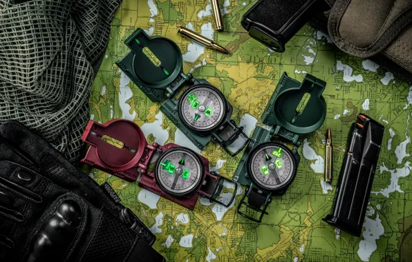 Map, gloves, bullets, clip, compasses