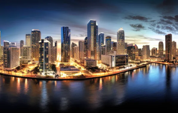 The sky, clouds, night, the city, lights, river, shore, building