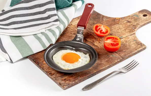 Board, scrambled eggs, vegetables, tomato