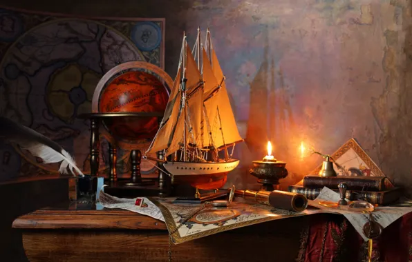 Pen, sailboat, candles, globe
