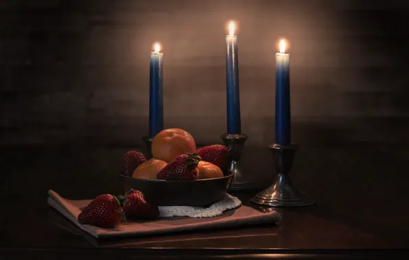 Candles, strawberry, tangerines