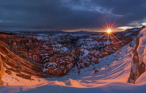 Picture the sun, snow, sunset, rocks