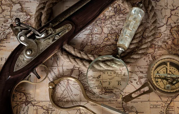 Map, rope, magnifier, compass, pistol