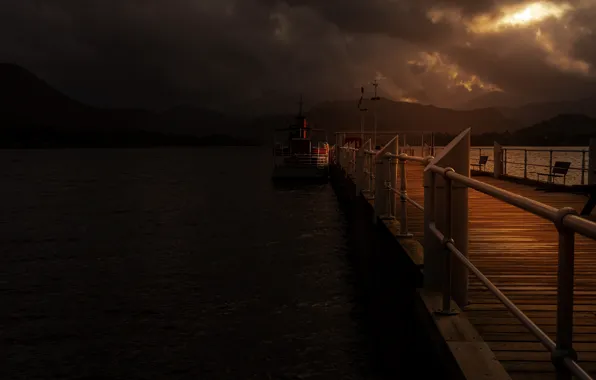 The sky, light, mountains, clouds, the dark background, boat, pierce, twilight