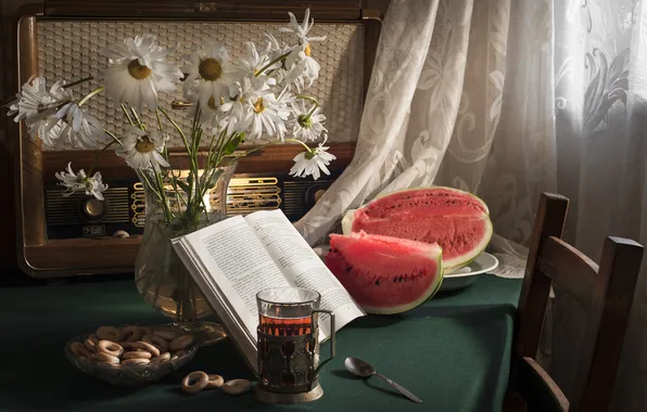 Flowers, tea, chamomile, watermelon, book, still life